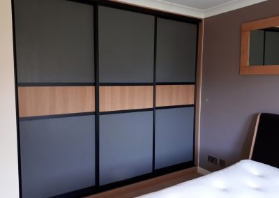 Client sliding wardrobe in wood material 2